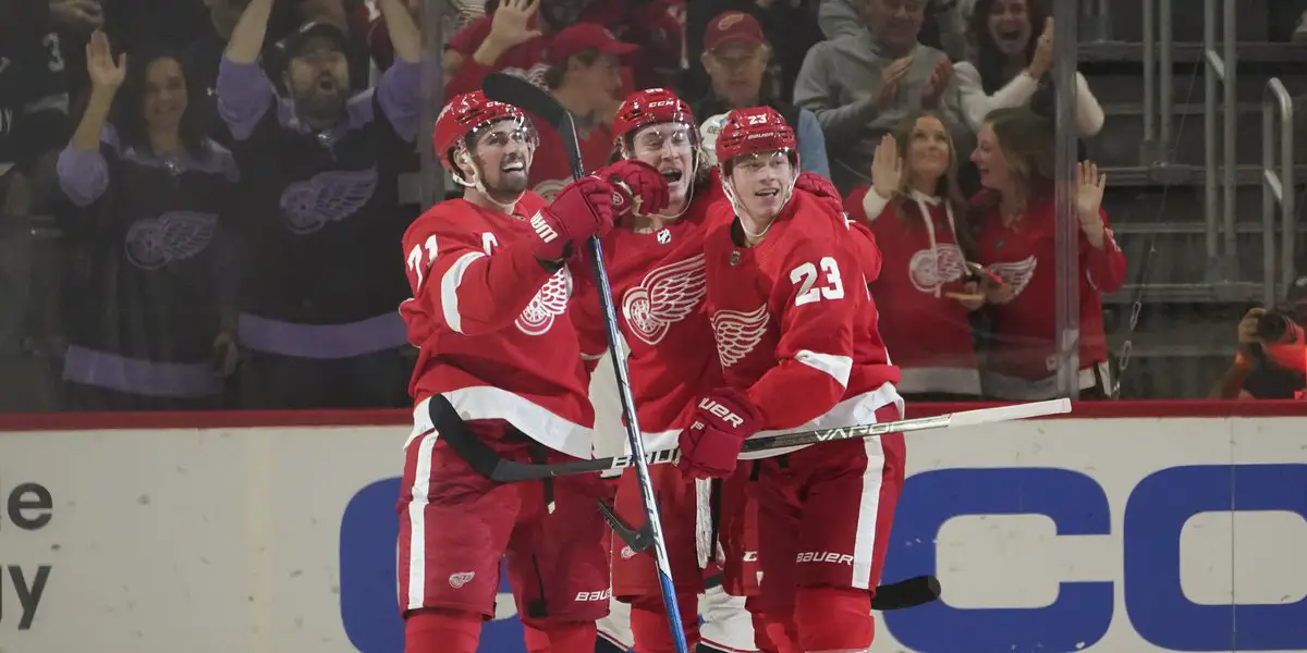 Dylan Larkin, Tyler Bertuzzi, and Lucas Raymond