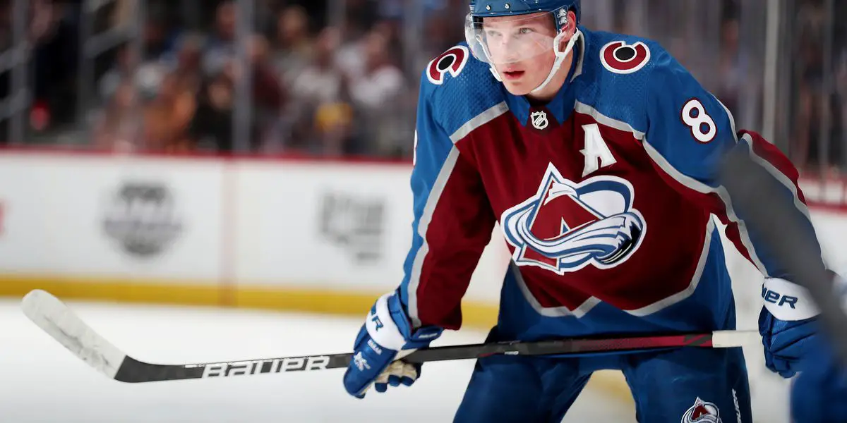 Cale Makar skating for the Colorado Avalanche in a home jersey