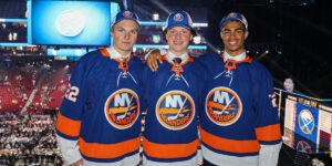 Calle Odelius, Quinn Finley, and Isaiah George posing after being drafted by the Islanders