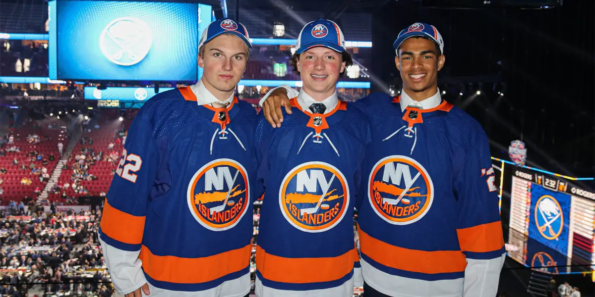 Calle Odelius, Quinn Finley, and Isaiah George posing after being drafted by the Islanders