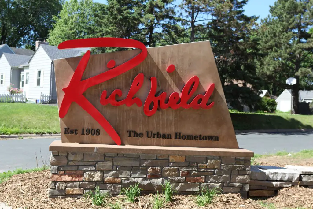 A sign with red text for Richfield Minnesota