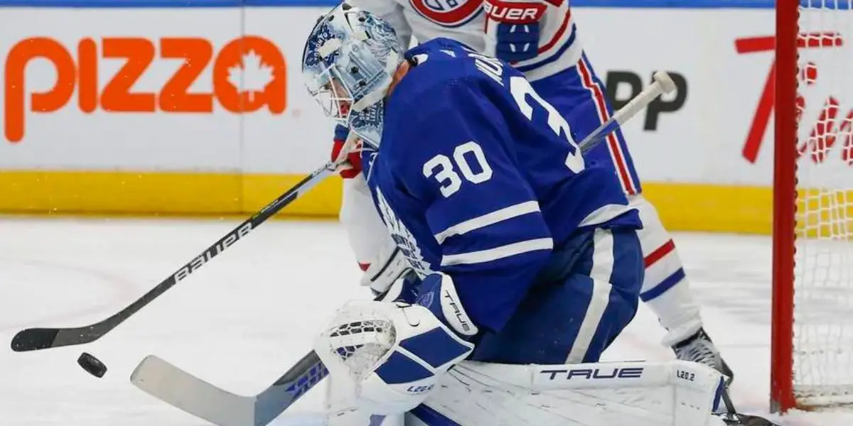 Matt Murray making save on Montreal Canadiens player