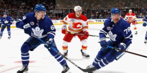 Maple Leafs Defenseman TJ Brodie Retrieves Puck in Defensive Zone Vs. Flames