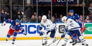 Maple Leafs Forward Pierre Engvall Skates With Puck in Neutral Zone Vs. Rangers