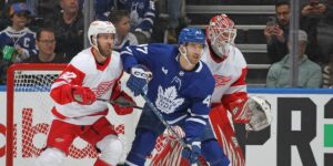 Leafs Forward Pierre Engvall Trying to Provide a Screen Infront of the Red Wings Goal