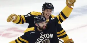 Taylor Hall and Nick Foligno skating for the Boston Bruins