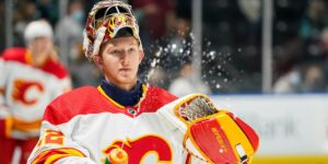 Dustin Wolf in net for Calgary Flames Photo by Christopher Mast/NHLI via Getty Images