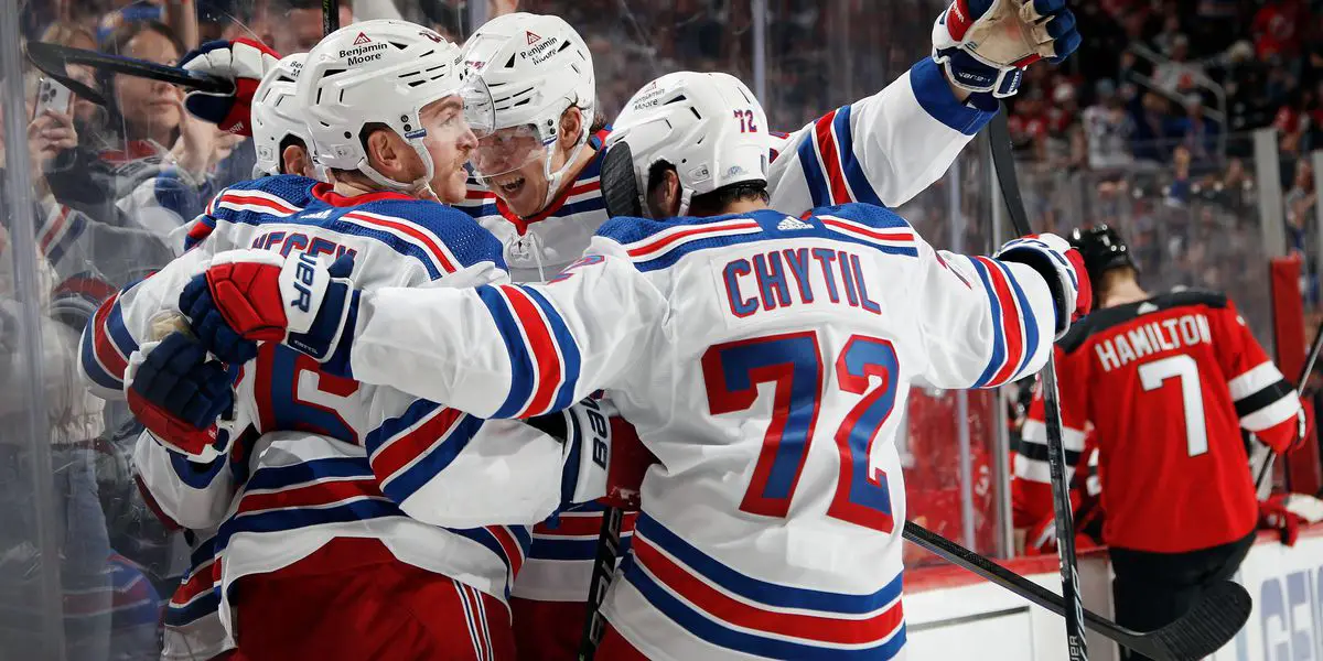 Kreider scores twice in Rangers' season-opening 5-1 win over