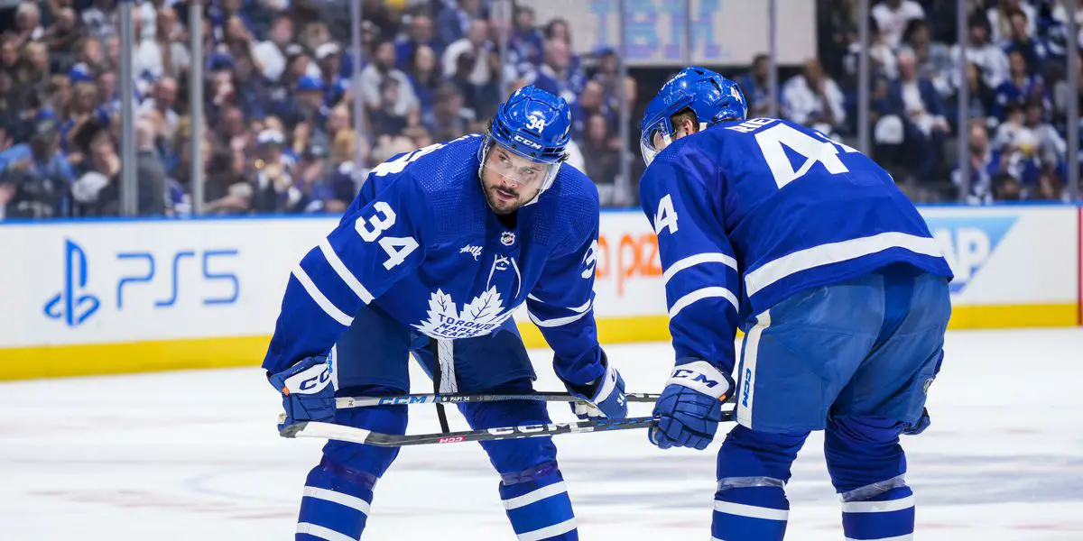 Maple Leafs Star Auston Matthews Talking to Teammate Morgan Rielly Prior to Puck Drop