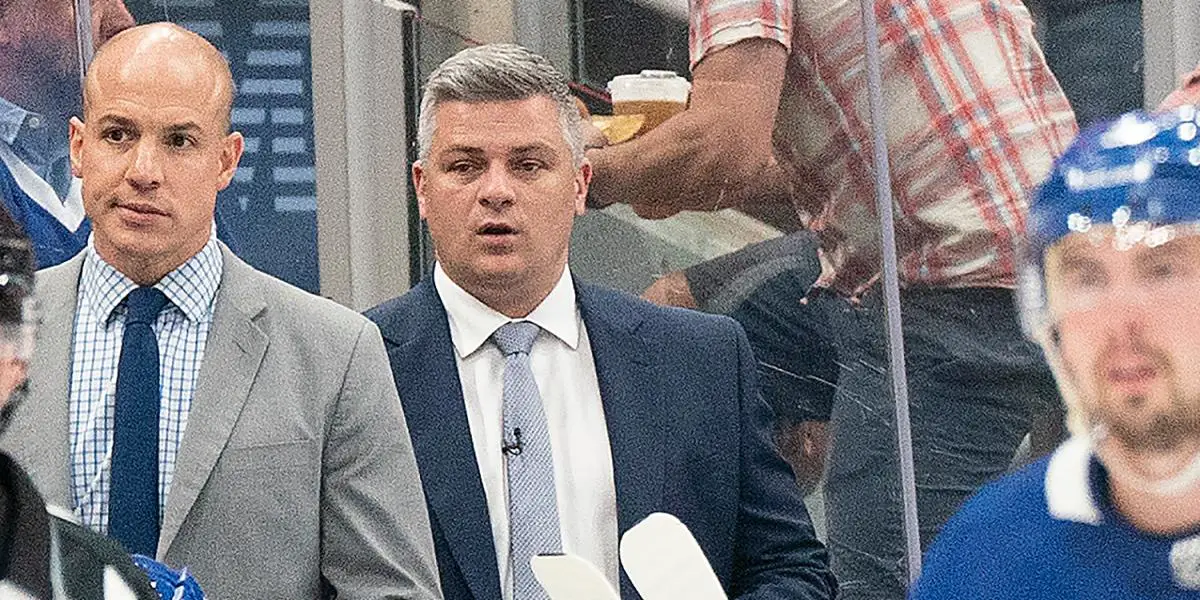 Maple Leafs head coach Sheldon Keefe behind the bench.