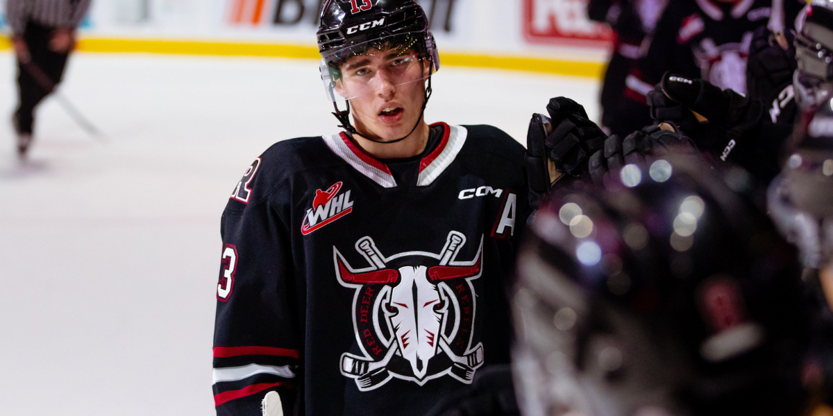 Kalan Lind celebrating a goal with the Red Deer Rebels