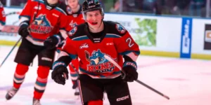 Kelowna Rockets Center Andrew Cristall Skating Towards Bench to Celebrate Goal