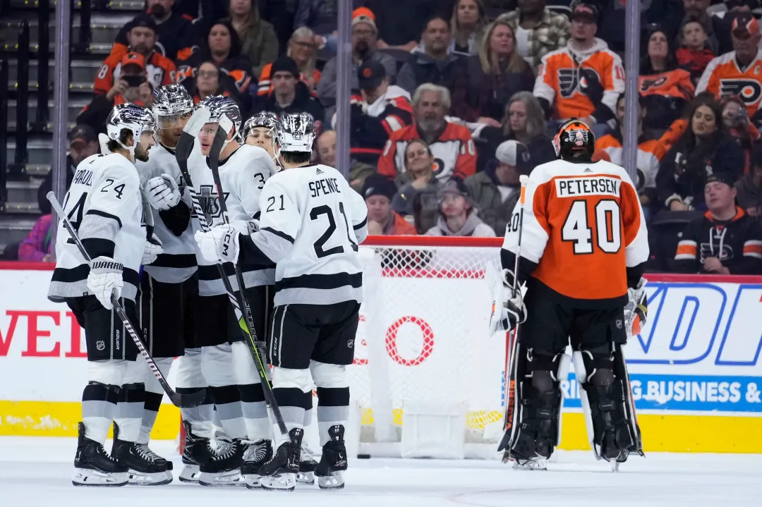 Los Angeles Kings players celebrate after a goal by Arthur Kaliyev during the second period Saturday against the Philadelphia Flyers. (Matt Slocum/Associated Press)