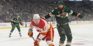 Zach Bogosian in a Minnesota Wild jersey against the Calgary Flames