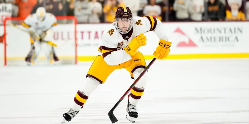 Josh Doan races for the puck in a game for Arizona State University