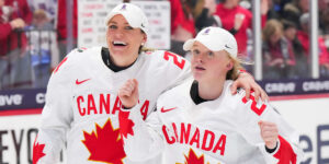 Natalie Spooner and Emma Maltais of Team Canada win gold at the 2024 Women's World Championship