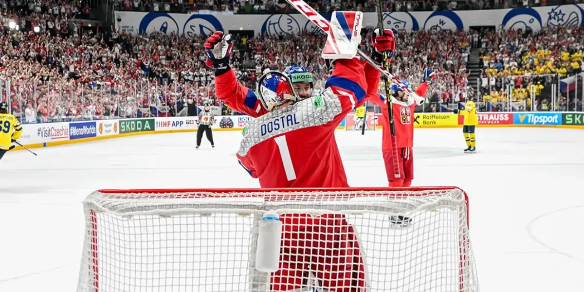 Lukas Dostal and Radko Gudas celebrate after winning IIHF semifinals