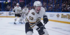 Andrew Peeke #52 skating for the Boston Bruins against the Tampa Bay Lightning