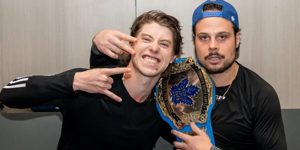 Mitch Marner and Auston Matthews with the belt