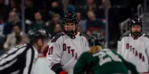 Gabbie Hughes getting ready to take a face off