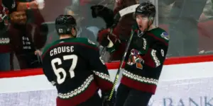 Lawson Crouse and Clayton Keller Celebrating a Goal