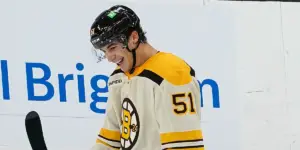 Matthew Poitras skating for the Boston Bruins