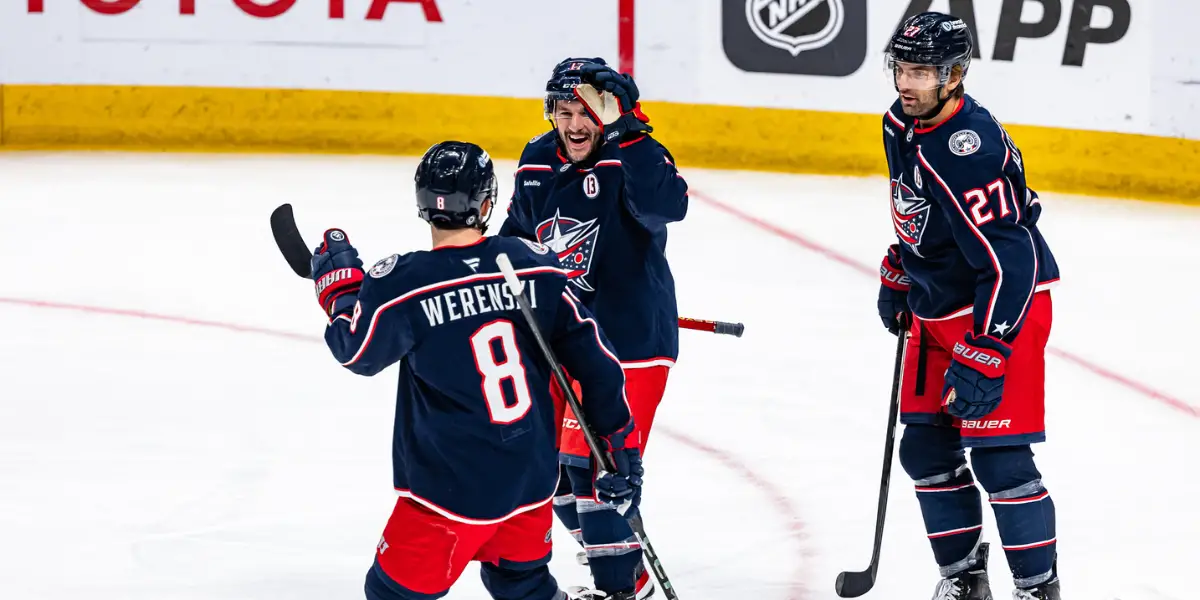 Zach Werenski Celebrates goal with team