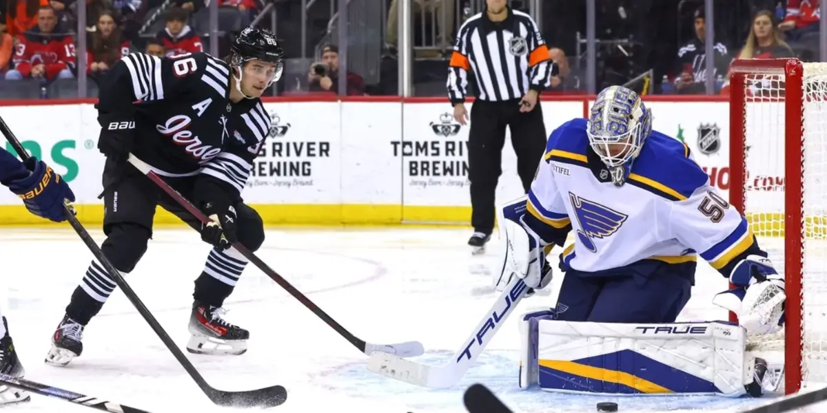 Jordan Binnington makes a save against the New Jersey Devils.