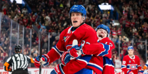 Patrik Laine and Cole Caufield celebrating a goal for the Montreal Canadiens