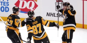 Pittsburgh Penguins celebrating a goal against the Toronto Maple Leafs