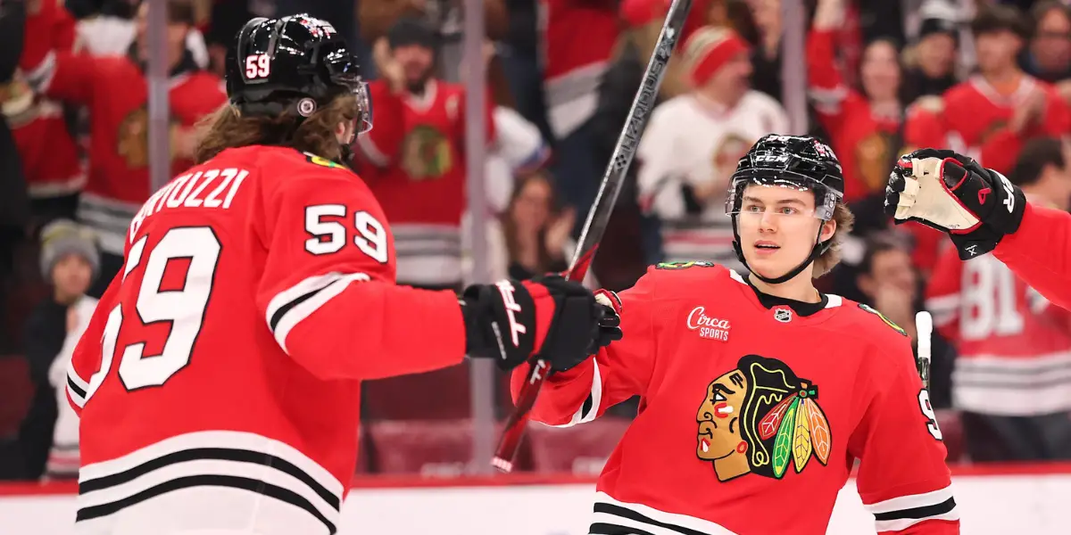 Chicago Blackhawks Connor Bedard and Tyler Bertuzzi celebrating a goal