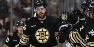 Justin Brazeau celebrating a goal with the Boston Bruins