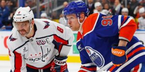 Alex Ovechkin and Corey Perry at a faceoff