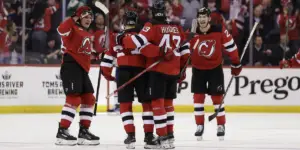 Jesper Bratt celebrates with teammates after scoring a third-period goal against the Oilers.