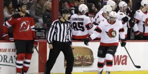 Johnathan Kovacevic looks on as the Ottawa Senators celebrate a goal in the second period.