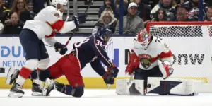 Bobrovsky makes a save on Boone Jenner. (AP Photo/Paul Vernon)