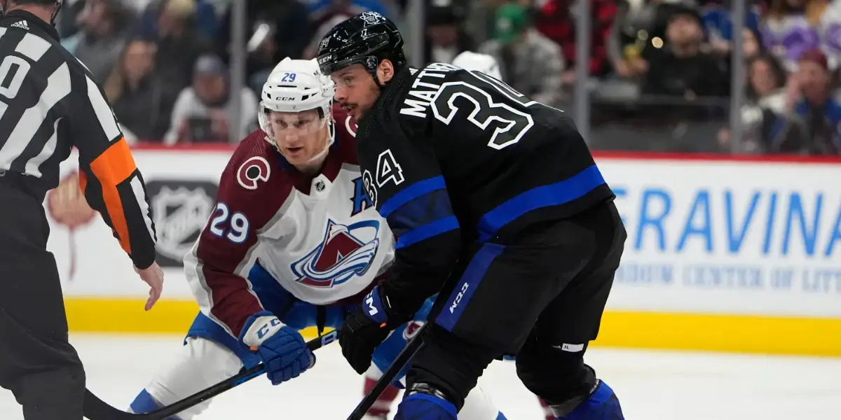 Nathan MacKinnon and Auston Matthews at a faceoff