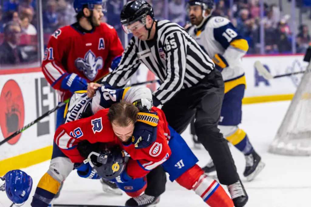 Trois-Rivieres Lions forward Nicolas Guy gets into a scrum during Game 2 of the North Division Finals