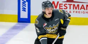 Roger McQueen skating for the Brandon Wheat Kings