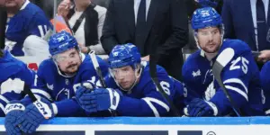 Toronto Maple Leafs Brandon Carlo and Auston Matthews on the bench