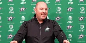 Steve Spott at the podium after a Dallas Stars practice