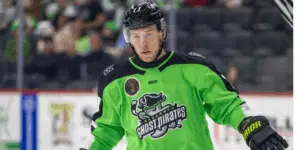 Connor Gregga in green Savannah Ghost Pirates uniform