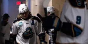 Logan Nelson in tunnel wearing white Knight Monsters jersey