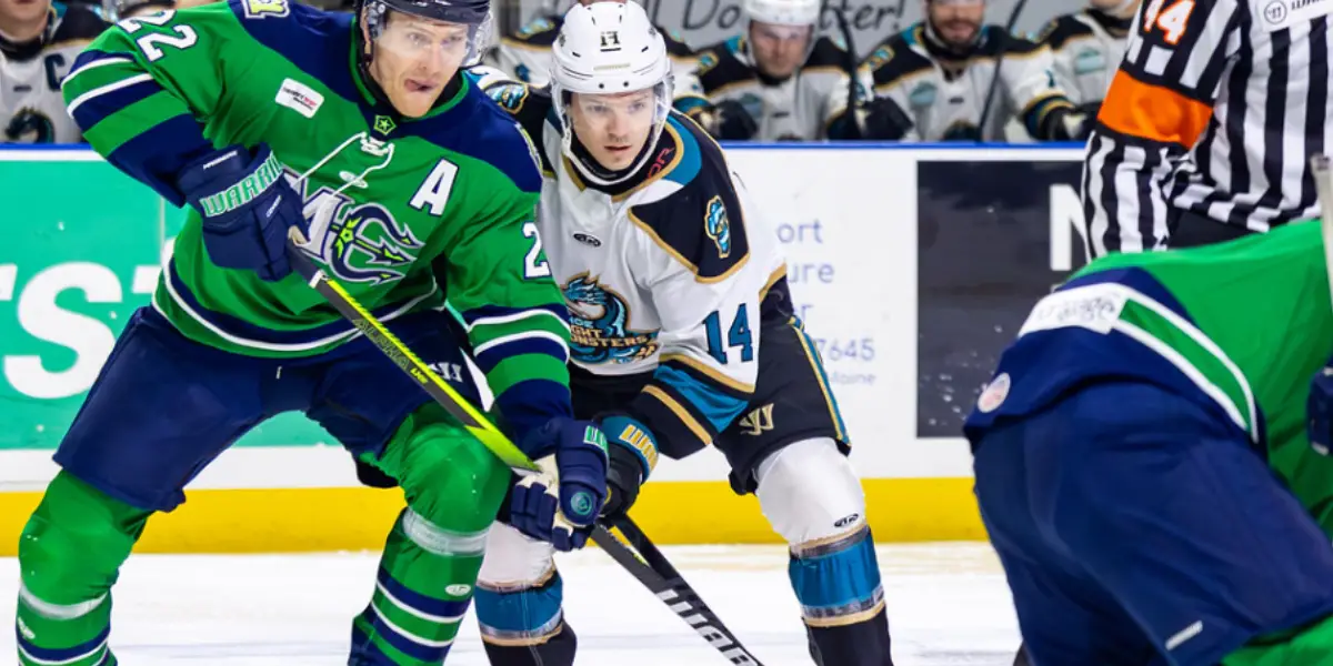 Forward Patrick Newell and Maine Mariners player going for the puck after a faceoff