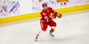 AHL: Calgary Wranglers Re-Sign Simon Mack